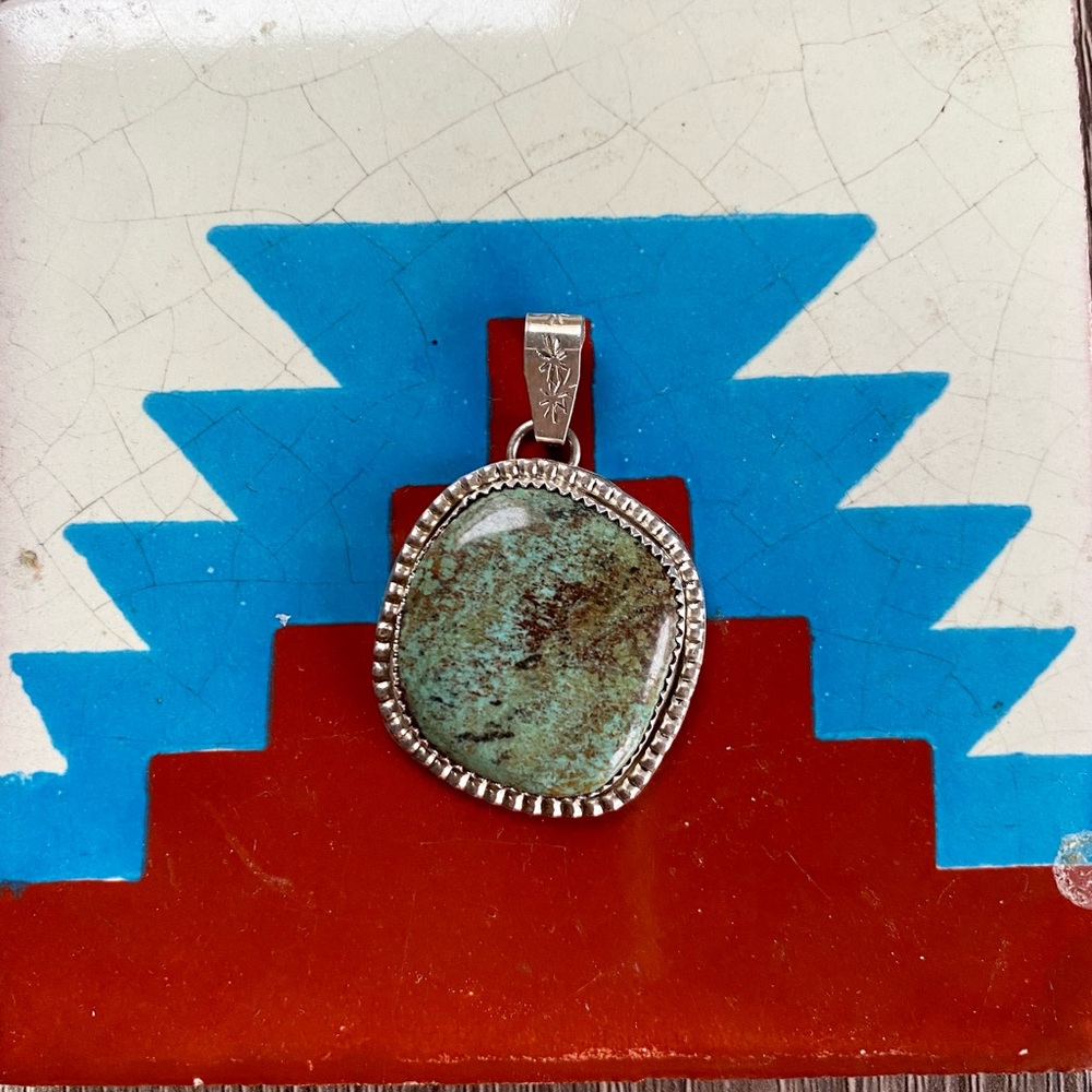 Navajo turquoise sterling silver pendant
